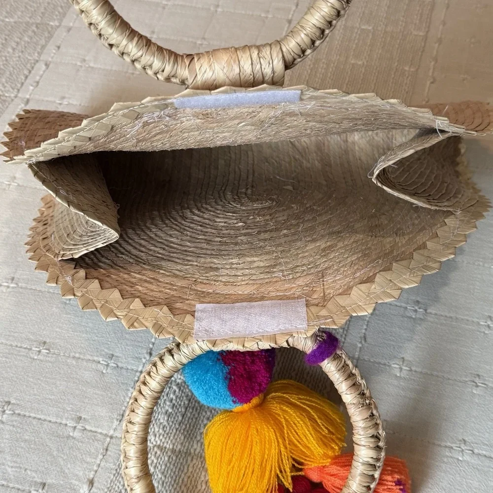 Woven Semi-Circle Top Handle Bag with Colorful Pom Accent Women's Handbag